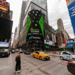 Times Square street with taxis, billboards, and skyscrapers