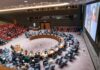 Ukraine Peace Talks Hit A Familiar Wall Delegates seated around a circular conference table in a large chamber