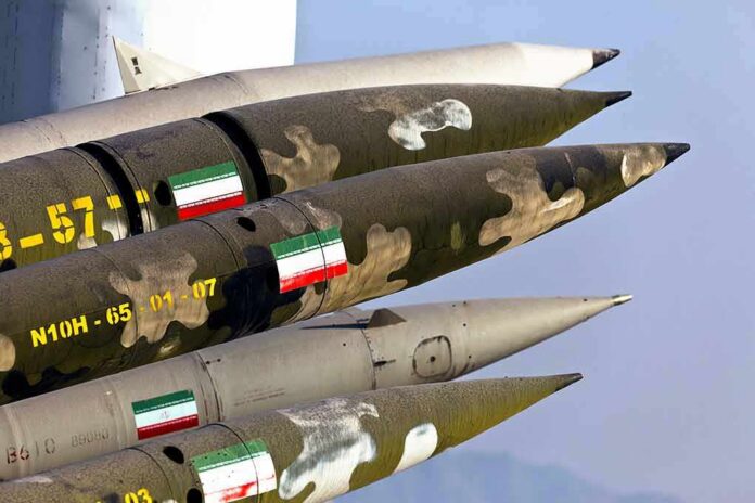 shutterstock_2114271674 Cluster of camouflage-painted missiles with pointed noses