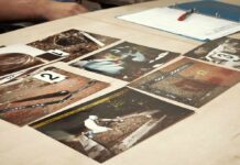 Crime scene photos laid out on a desk