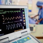 Medical Gatekeepers Quietly Pull The Strings Patient monitor displaying vital signs in a hospital room