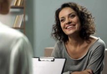 Smiling woman talking during a meeting