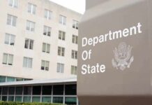 Drink Toss Fallout: State Adviser Out Department of State sign outside office building