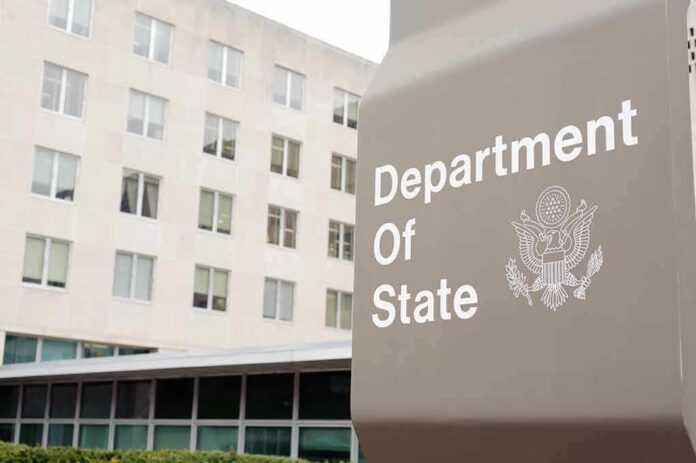 shutterstock_179052941-1 Department of State sign outside office building