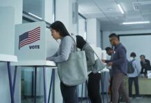Voters at polling booths in a modern voting center