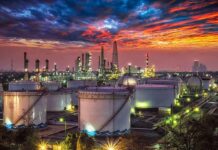 Why America Is Lending Out Emergency Oil Oil refinery with storage tanks at sunset